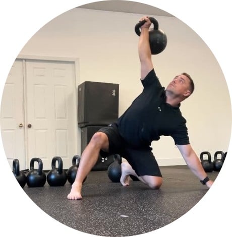 colin lifting a kettlebell